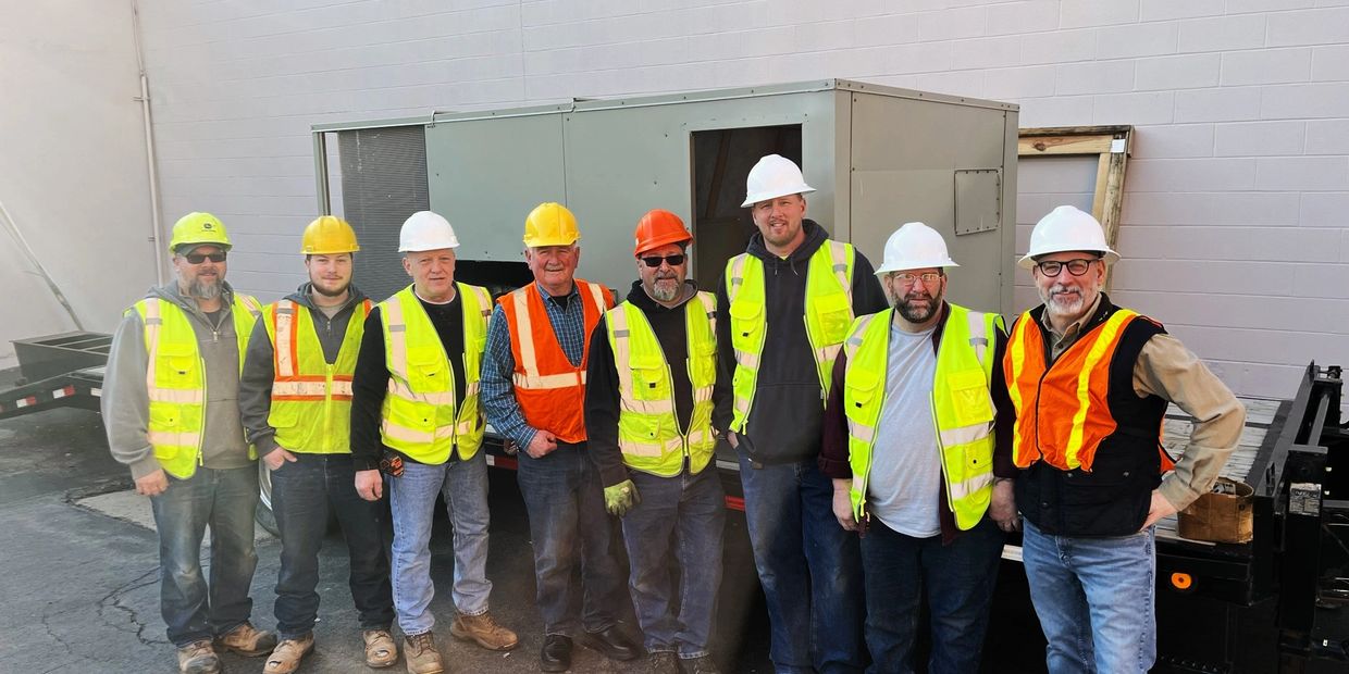 The K&B Plumbing and Heating crew on job site