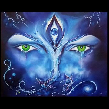 Surreal blue face with green eyes and mystical symbols.