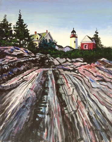 Looking up a rocky cost at lighthouse