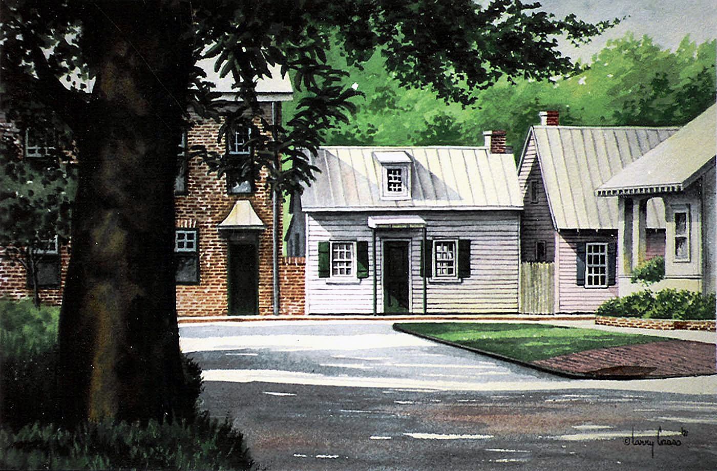 Cottage with a large oak tre in sillouete and shadows flowing across the road in front