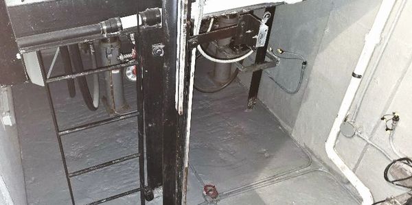 Double elevator pit cleaned, sealed, and sump pump installed
