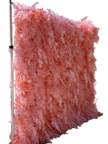 Pink decorative backdrop with fluffy texture on a stand.