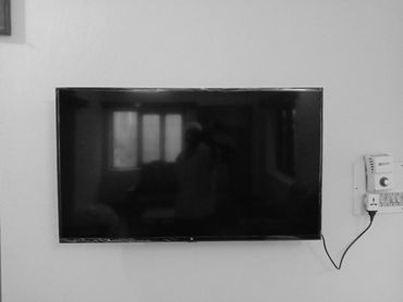 fixed tv stand wall fixing 