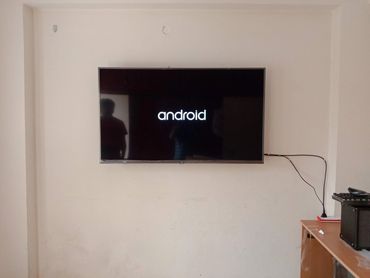 50 inches tv fitting on wall as per norms fittings