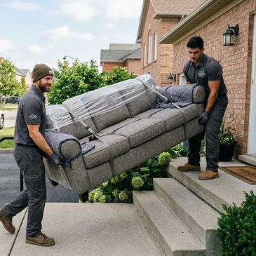 2 men moving a sofa