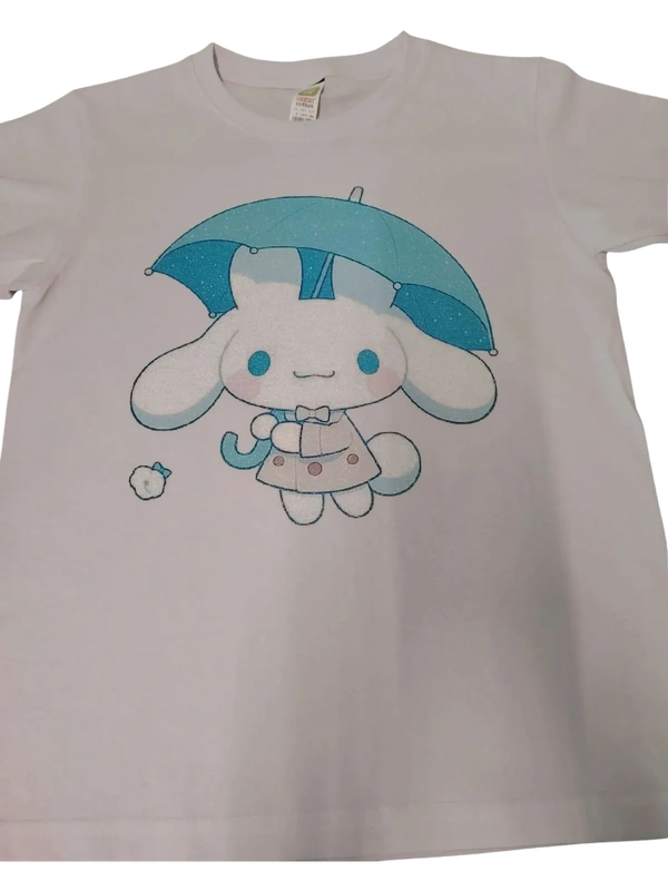 White t-shirt with cute cartoon bunny holding a blue umbrella.