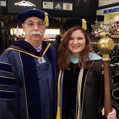 She is pictured with Professor Emeritus Ron Matson, then Senior Associate VP for Faculty Affairs.