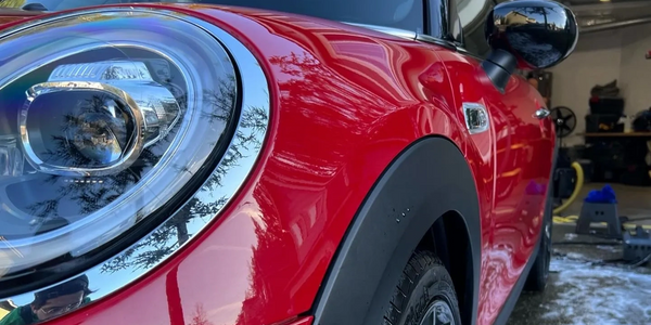 Shiny red Mini Cooper after mobile auto detailing in Maple Valley