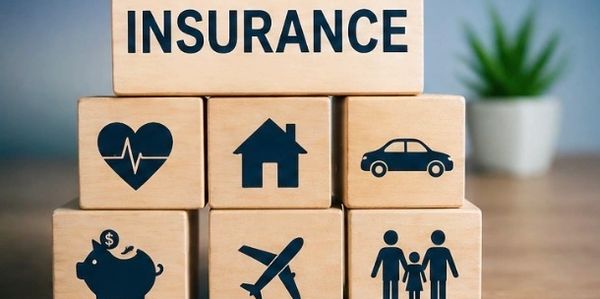 Wooden blocks representing various types of insurance.