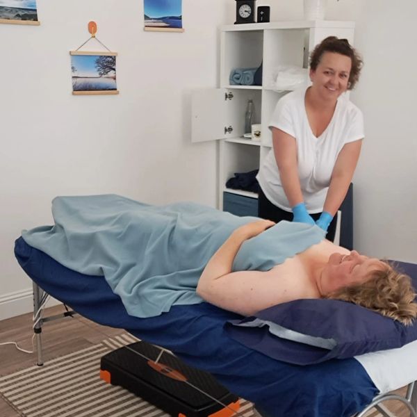 Morganne from Portobello Health Hub giving a client Sports Massage & Remedial Soft Tissue Therapy on