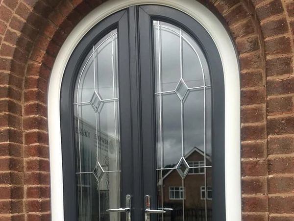 Arched composite double doors installed in Nottinghamshire by our trained fitters.