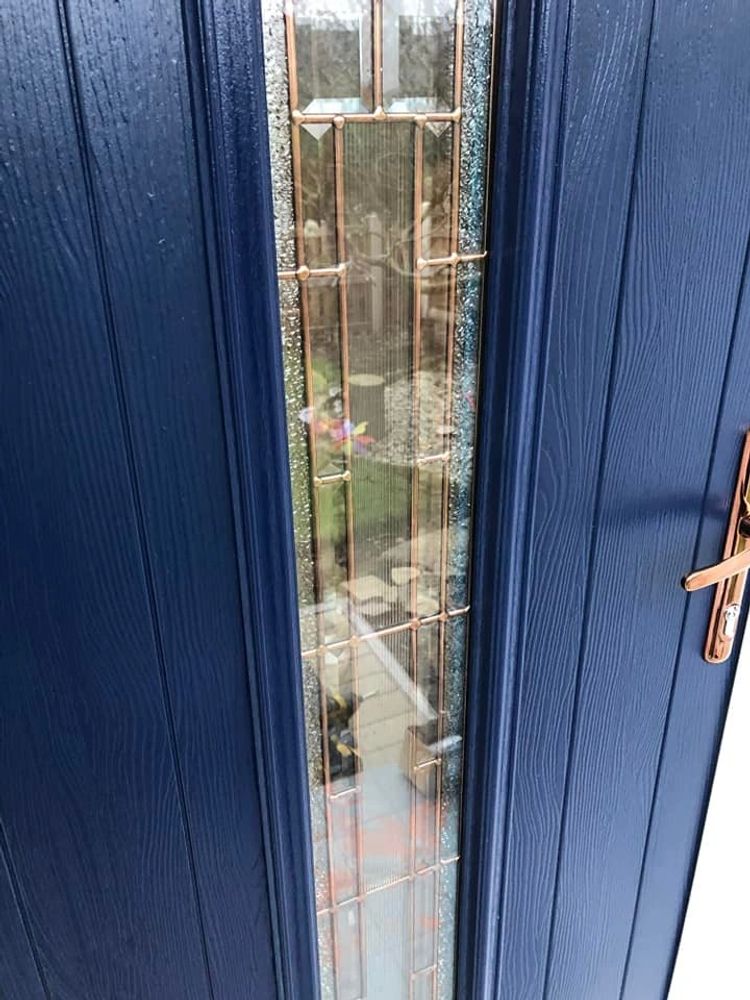 Solid Core Composite Front Door with Rose Gold Handles Installed in Mansfield by our Trained Fitters