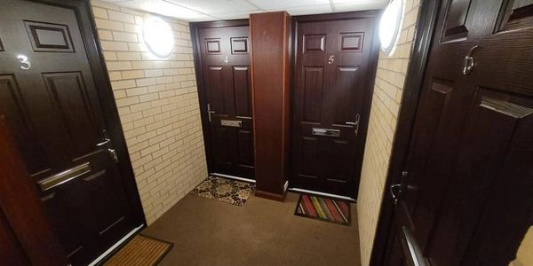 Rosewood Fd30s internally rated fire doors fitted in a block of flats in Nottinghamshire.
