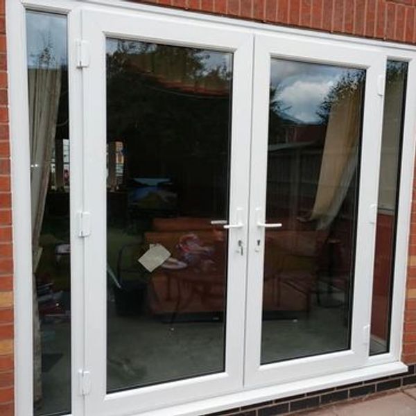 UPVC French Door set with side panels installed by our trained fitters in Nottingham.