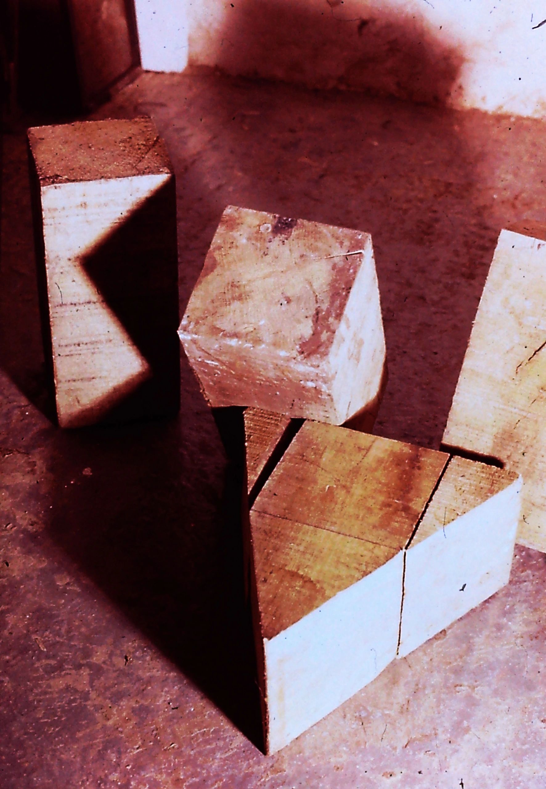 alt="wooden shapes blocks leaning supportively"