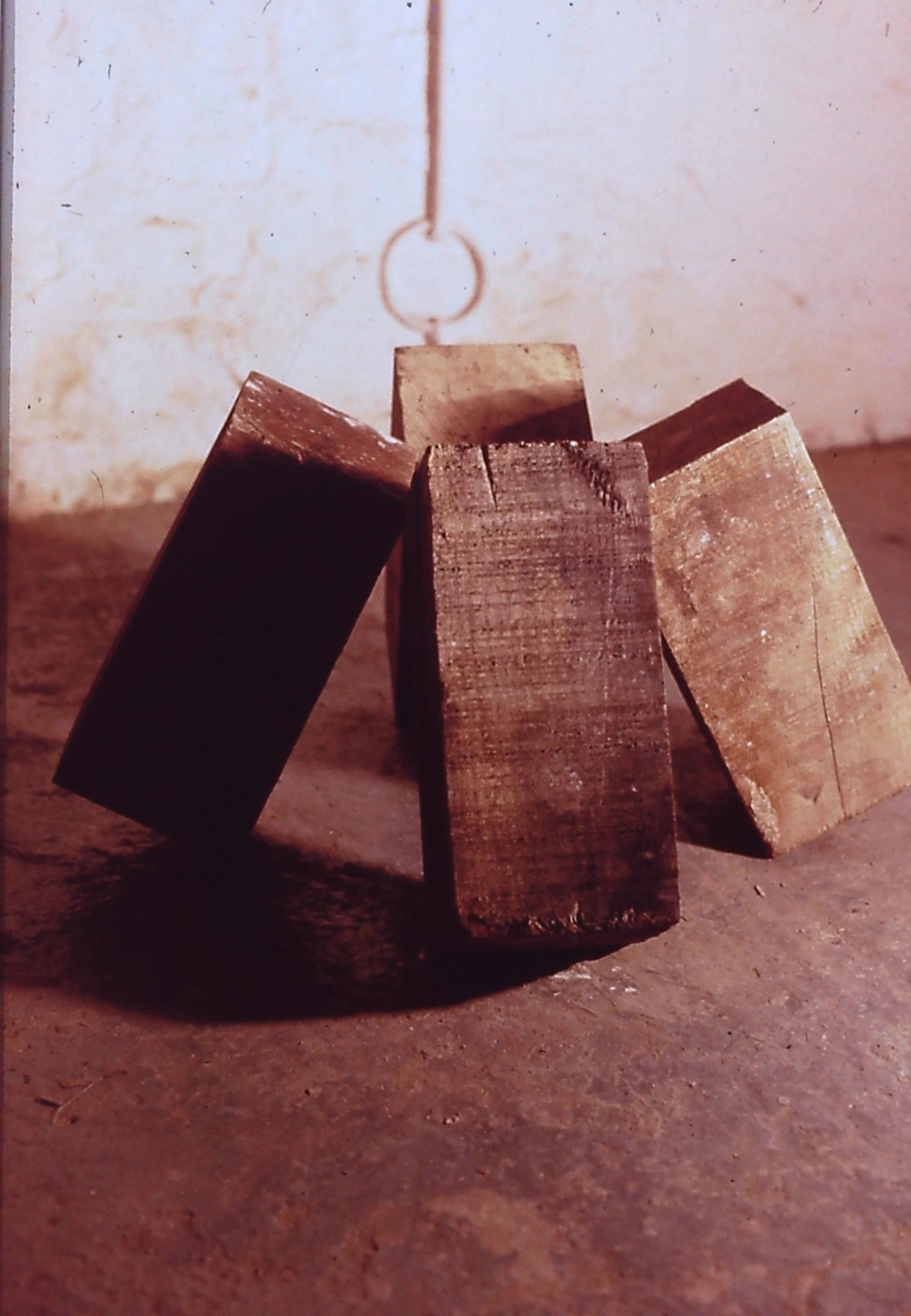 alt="Blocks of wood leaning supportively"