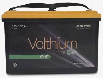 A Volthium 12V 150Ah deep cycle battery with a yellow top and black body.