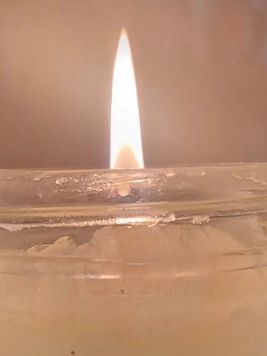 Picture of a lit candle.