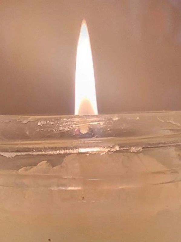 Picture of a lit candle.