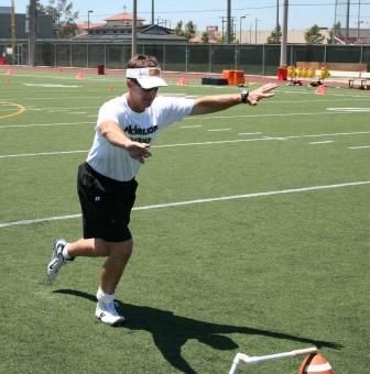 Ken Olson drive step wearing square toe football shoe for straight on kicking