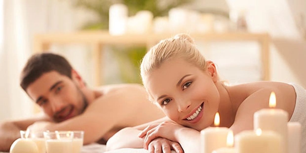 Happy couples massage clients
