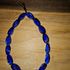 Blue glass bracelet.