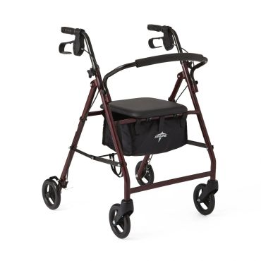 Four-wheeled walker with seat and storage bag for mobility support.