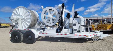 Bullwheel tensioner puller trailer