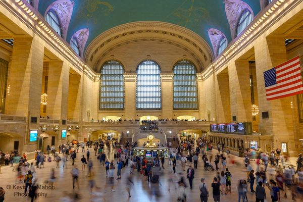 NYC, Grand Central Station, blur motion, American flag