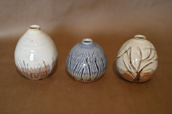 $35 each, 6" carved vases