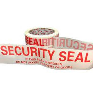Roll of security seal tape with red text.
