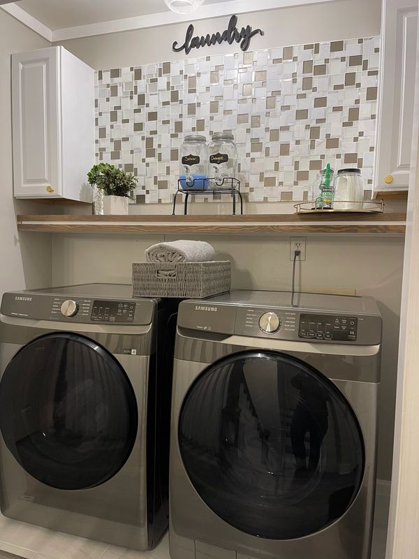 AFTER 
Installed cabinets , backsplash, floating shelf , trim and fresh paint 