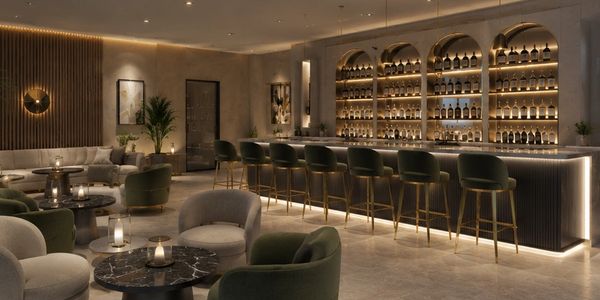 Elegant bar lounge with ambient lighting and plush seating.