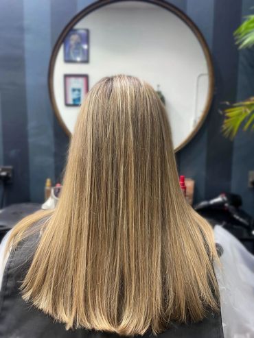 Freshly lightened and smoothed blonde hair using Wella Blondor at Santoro Hair Salon in Brighton.