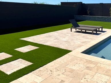 travertine and turf design dy Adrians hardscape and painting services in Arizona