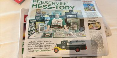 A newspaper feature on Michael D. Roberto and Hess toy trucks collection.