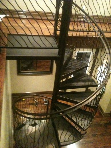 Custom Hand Forged Art-Growing Spiral Stair 