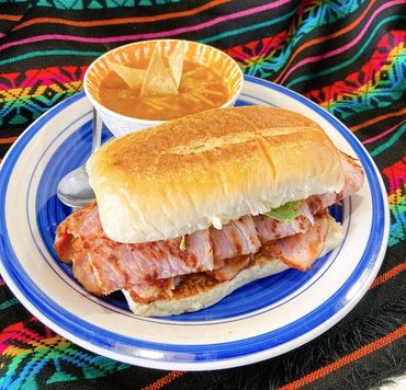 Artisan Mexican bread filled with pulled pork or smoked ham, avocado, mayo, and pico de gallo.