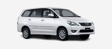 White multi-purpose vehicle with sleek design and silver rims.