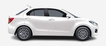 Side view of a compact white sedan car with sleek design.