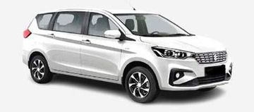 White compact SUV with modern design and black alloy wheels.