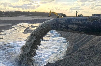 Mud or slurry being pumped at a construction site.