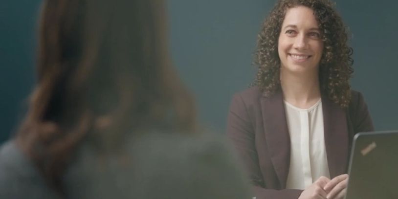 Jillian meeting with a business client in the Creekside Accounting office in Kelowna