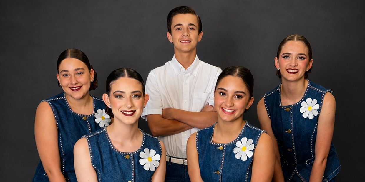 Group of four girls and one boy posing against a dark background.