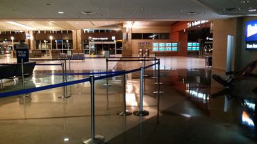 Lobby at an airport account.  Thousands of feet grind AZ dust into this floor every day- yet -- It s