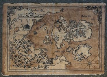 An old, weathered fantasy map showing the Elordia Kingdom and surrounding regions.
