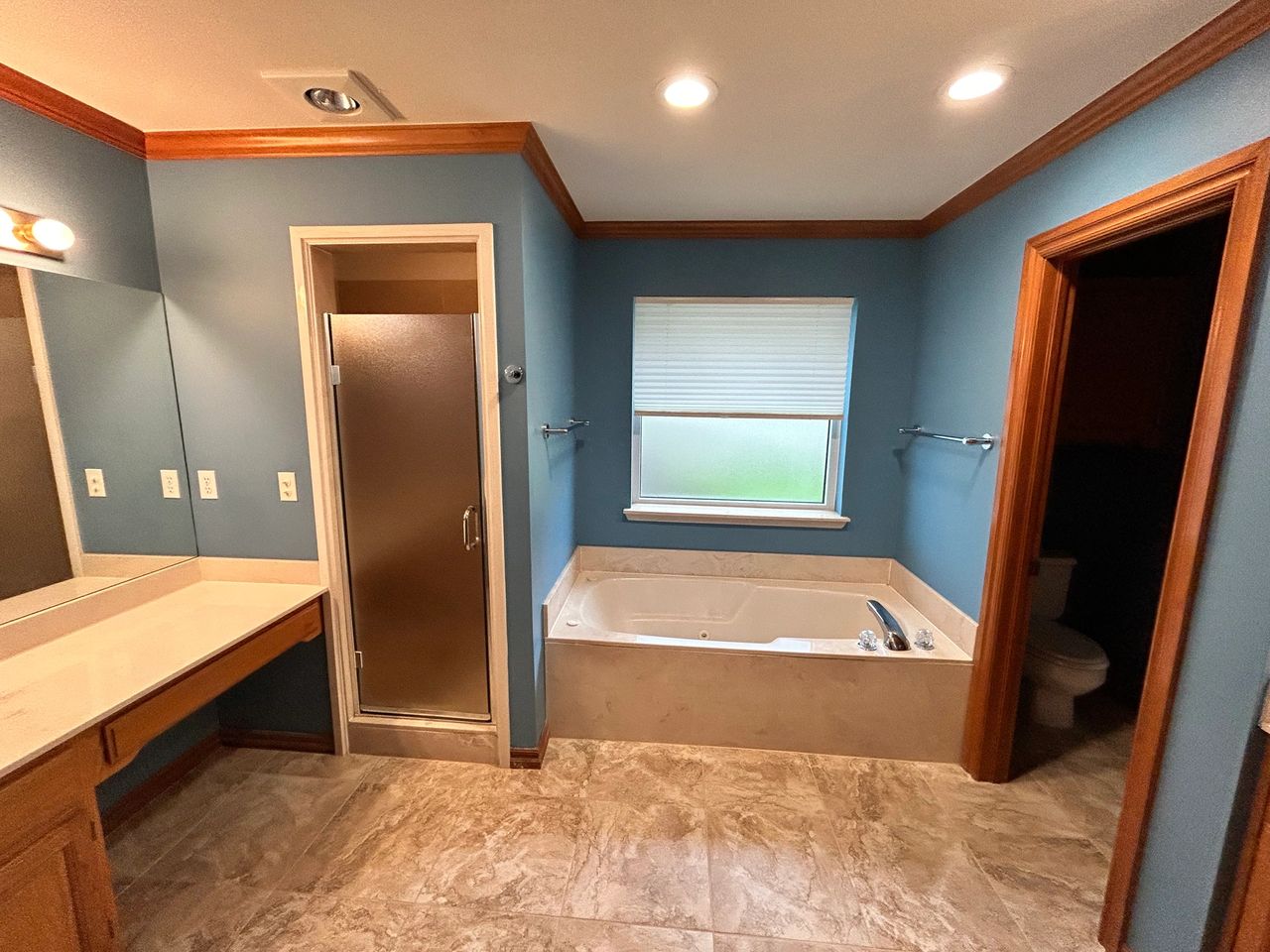 This shows the original layout with the shower in the left hand corner and the tub off to the right.