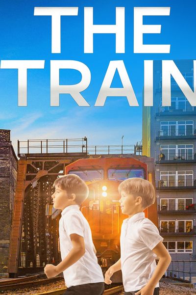 Two boys running near a train on tracks under a blue sky with text 'THE TRAIN'.
