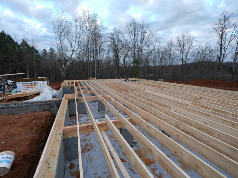 Floor joists over block foundation on red clay
