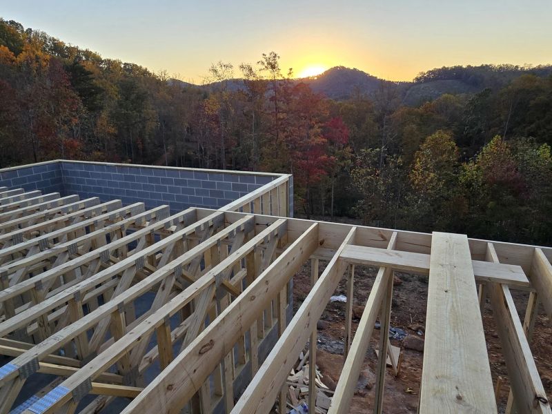 Floor system at dusk with autumn ridge behind